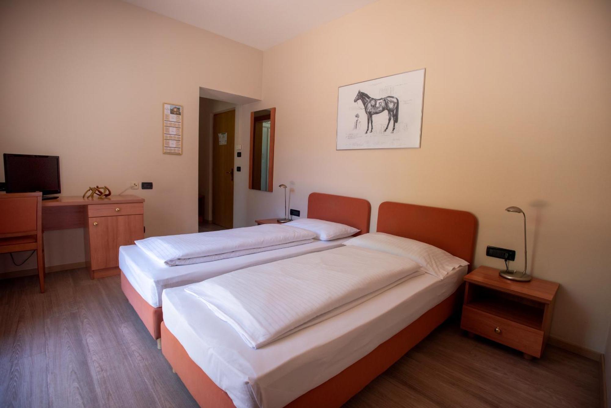 Cavallino S'roessl Hotel
